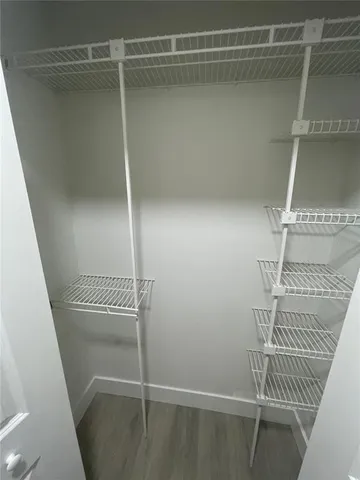 a view of small space with racks on the wall