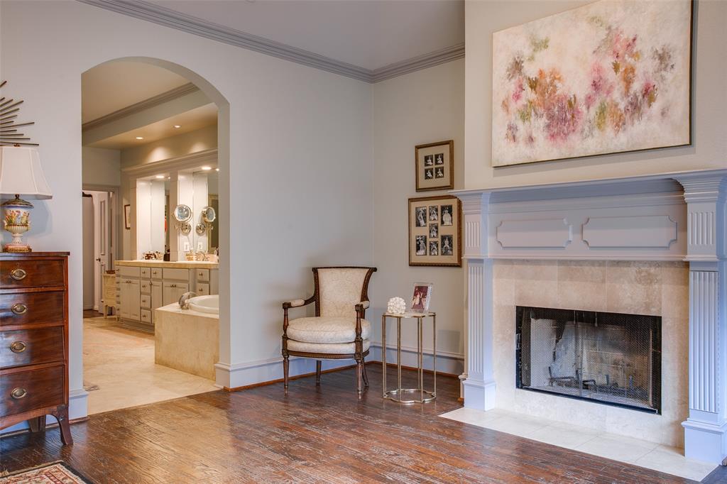 4139 Herschel Avenue Dallas, TX 75219 - Photo 20 of 30 a living room with furniture and a fireplace