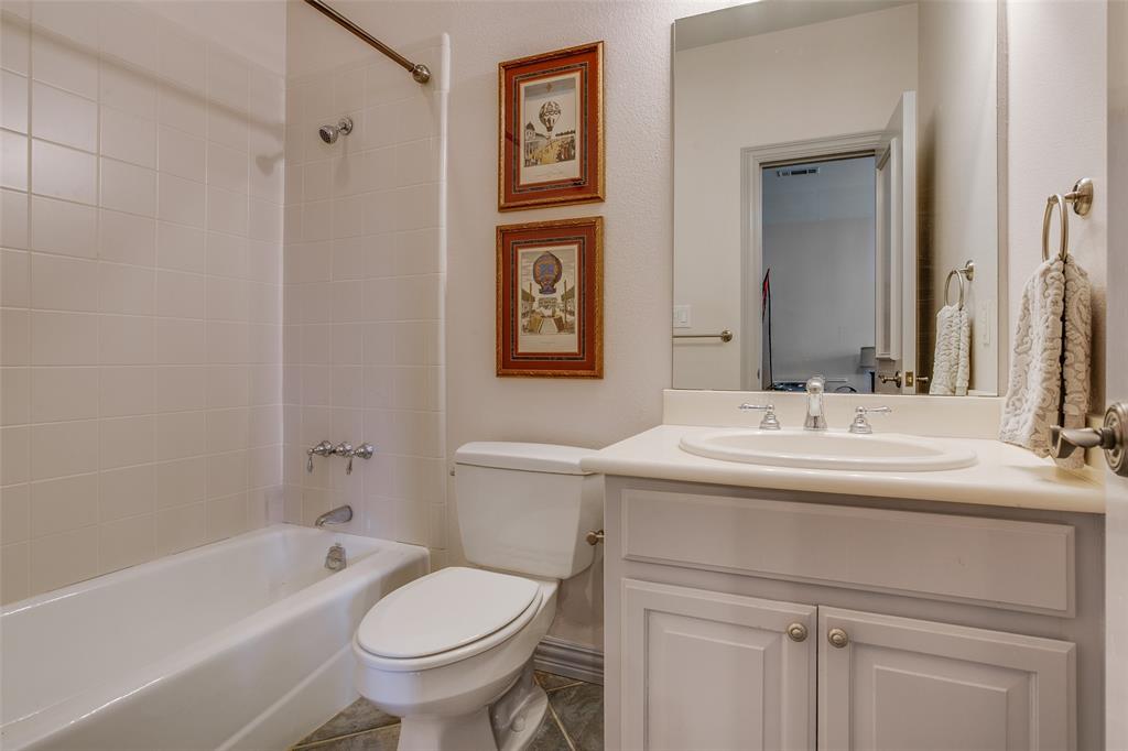 4139 Herschel Avenue Dallas, TX 75219 - Photo 26 of 30 a bathroom with a sink toilet and shower