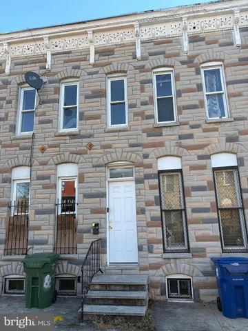 a front view of a building with glass windows