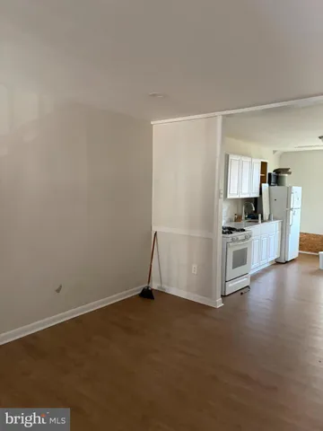 a view of a kitchen with a sink