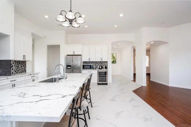 a view of a kitchen with a sink
