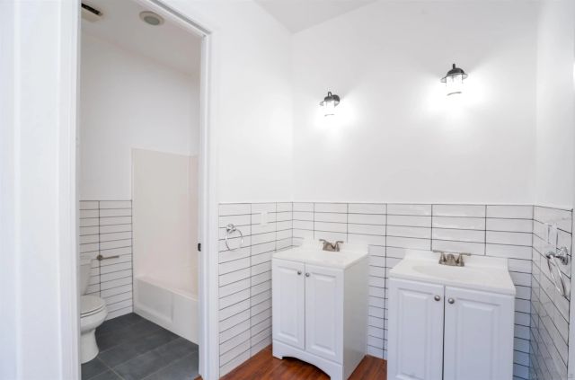 a view of city and mountain from a balcony