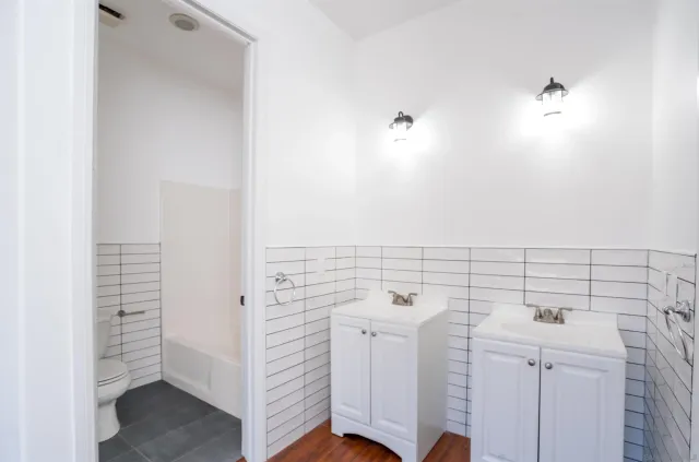 a view of city and mountain from a balcony