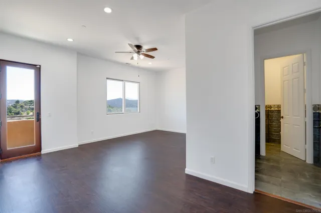 a house with trees in the background