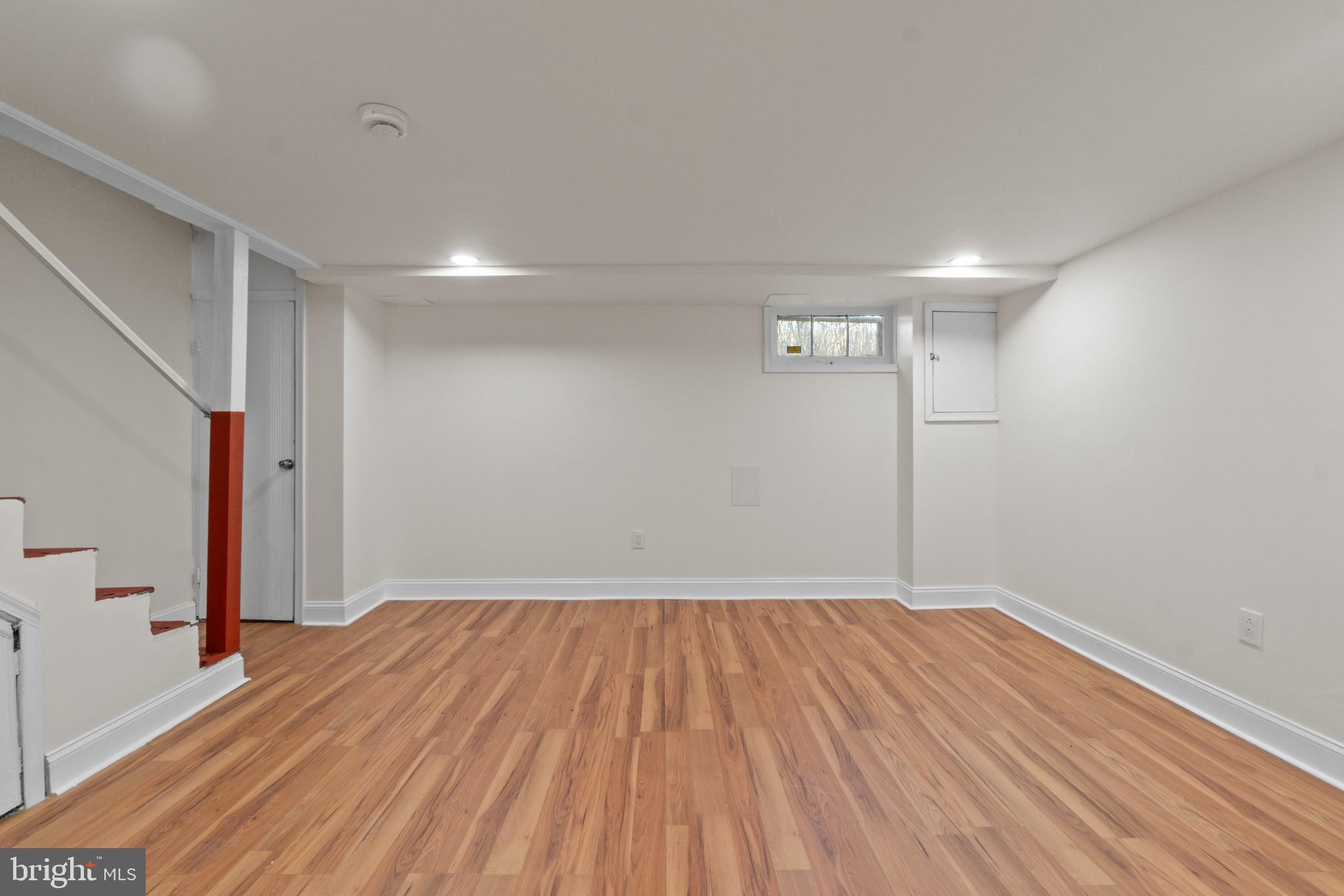 8340 Edgedale Road Baltimore, MD 21234 - Photo 28 of 33 a view of empty room with wooden floor