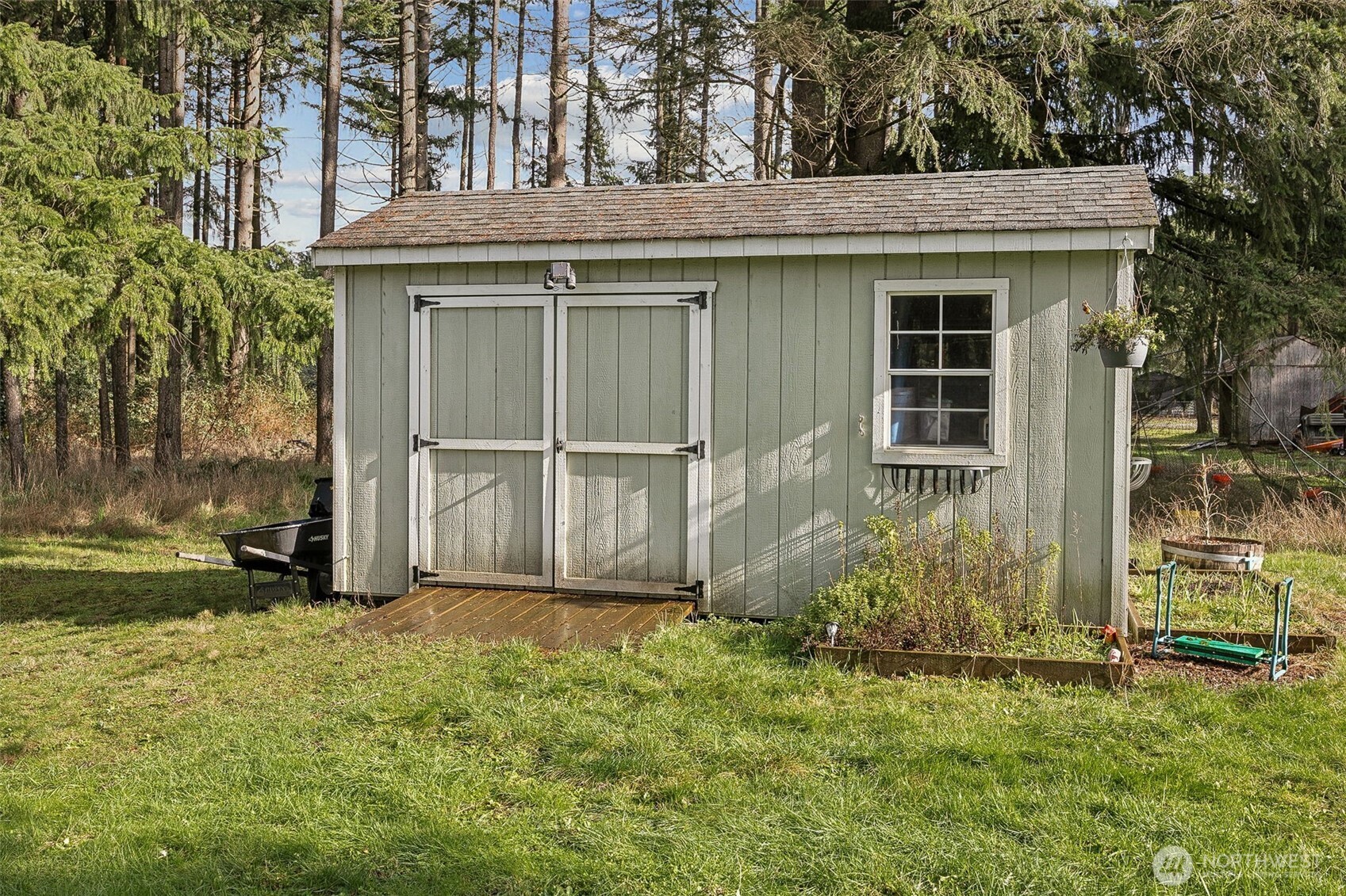 7510 191st Avenue Southwest Rochester, WA 98579 - Photo 22 of 28 a view of a house with a yard