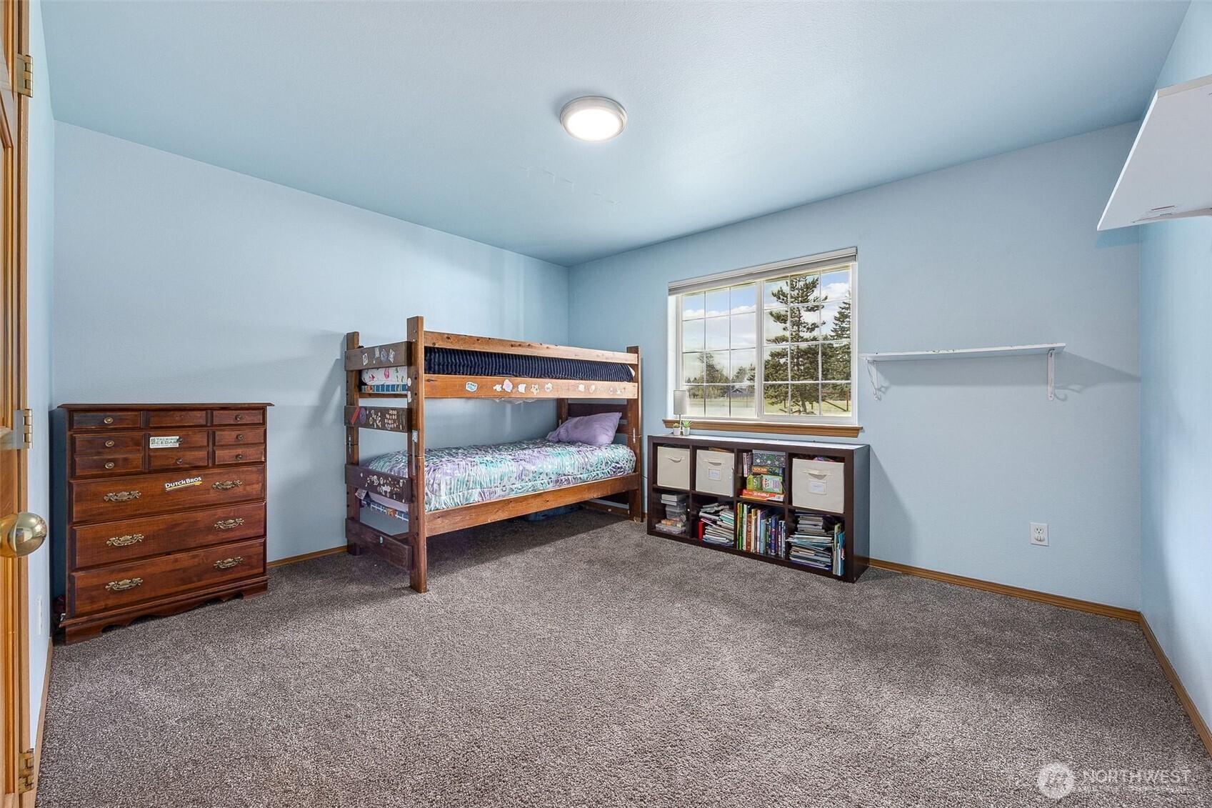 7510 191st Avenue Southwest Rochester, WA 98579 - Photo 6 of 28 a view of a room with window and cabinet