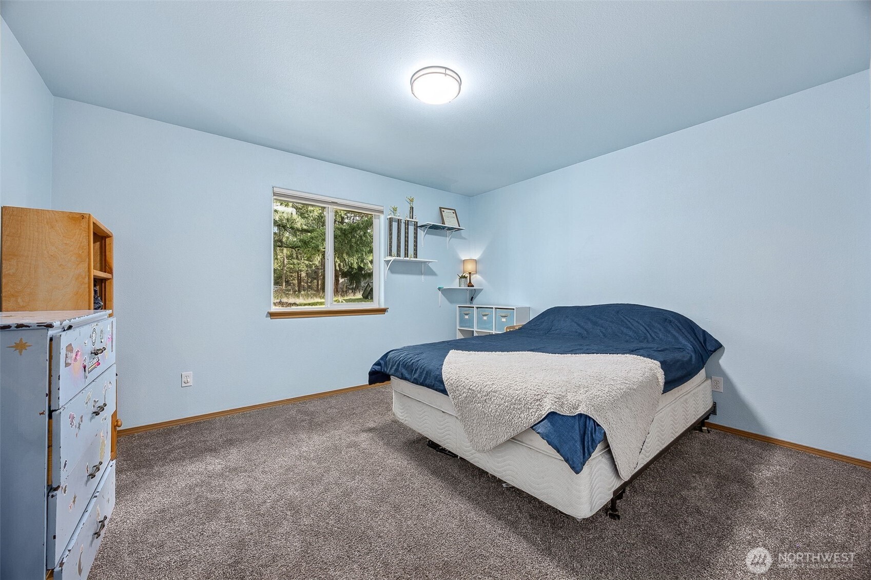 7510 191st Avenue Southwest Rochester, WA 98579 - Photo 8 of 28 a bedroom with a bed and a window