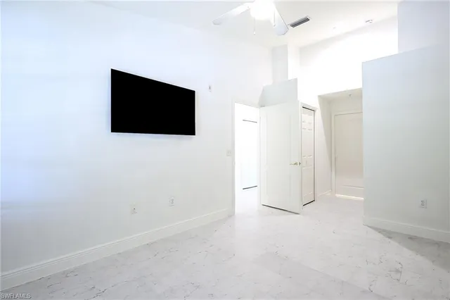 a view of a livingroom with a flat screen tv