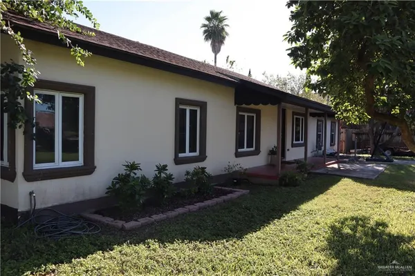 a house view with a garden space