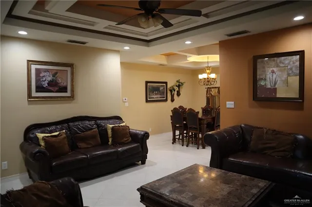 a living room with furniture and a couch