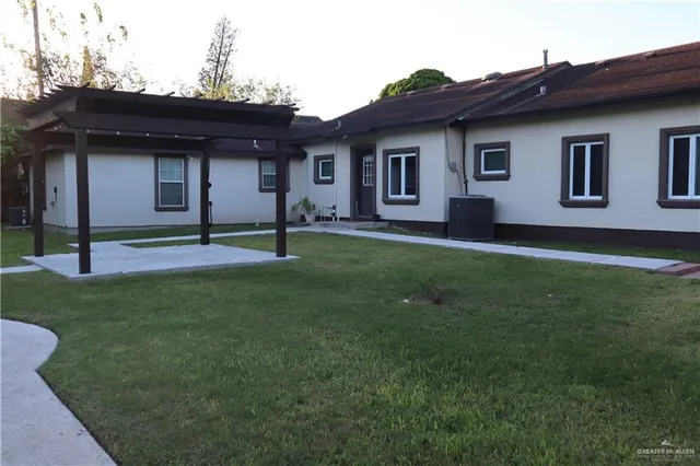 a backyard of a house with lots of green space