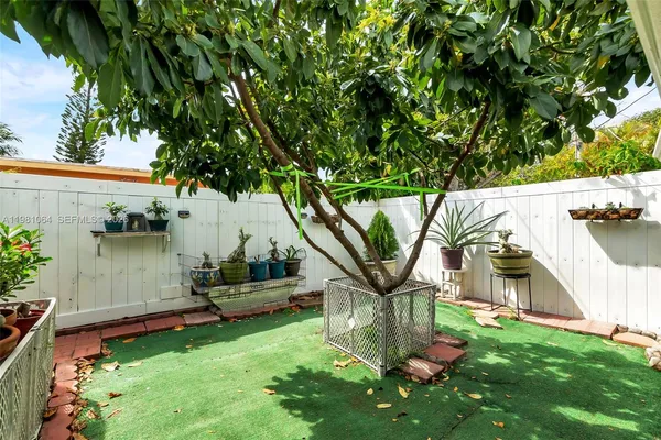 a garden view with a seating space