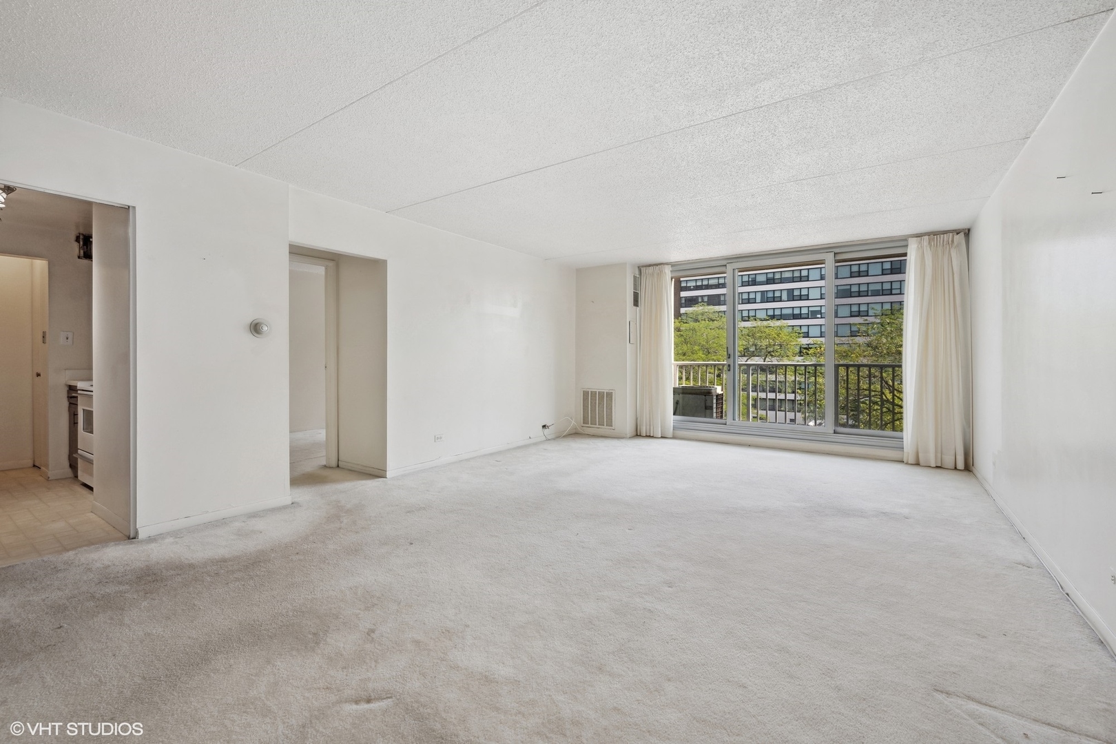 1625 Sheridan Road, Unit 406 Wilmette, IL 60091 - Photo 2 of 10 a view of an empty room with a window
