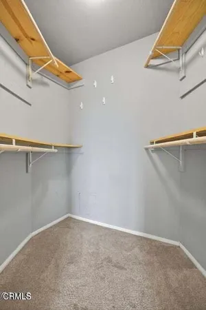 a view of a room with racks on the wall