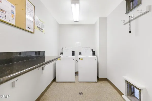 a view of a kitchen with electric appliances