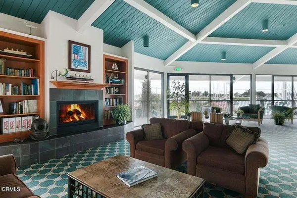 a patio with a table and chairs