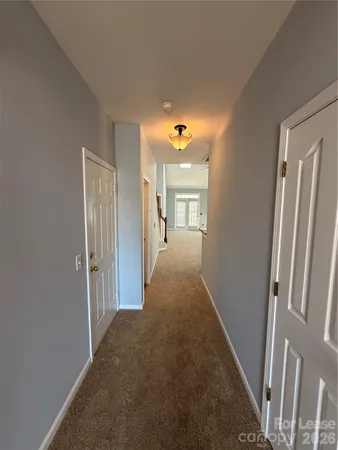 a view of hallway with livingroom