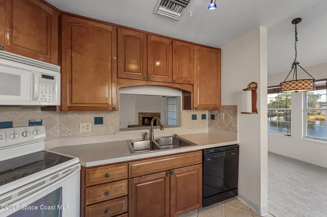 a room with furniture and a large window