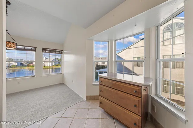 a kitchen with a sink stainless steel appliances and cabinets
