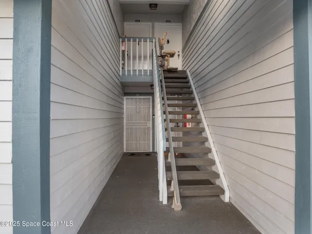 an aerial view of a city with lawn chairs