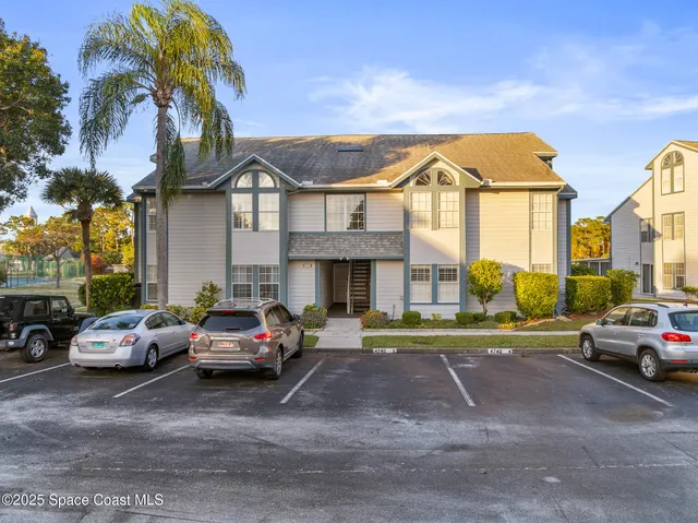a view of street with parked cars