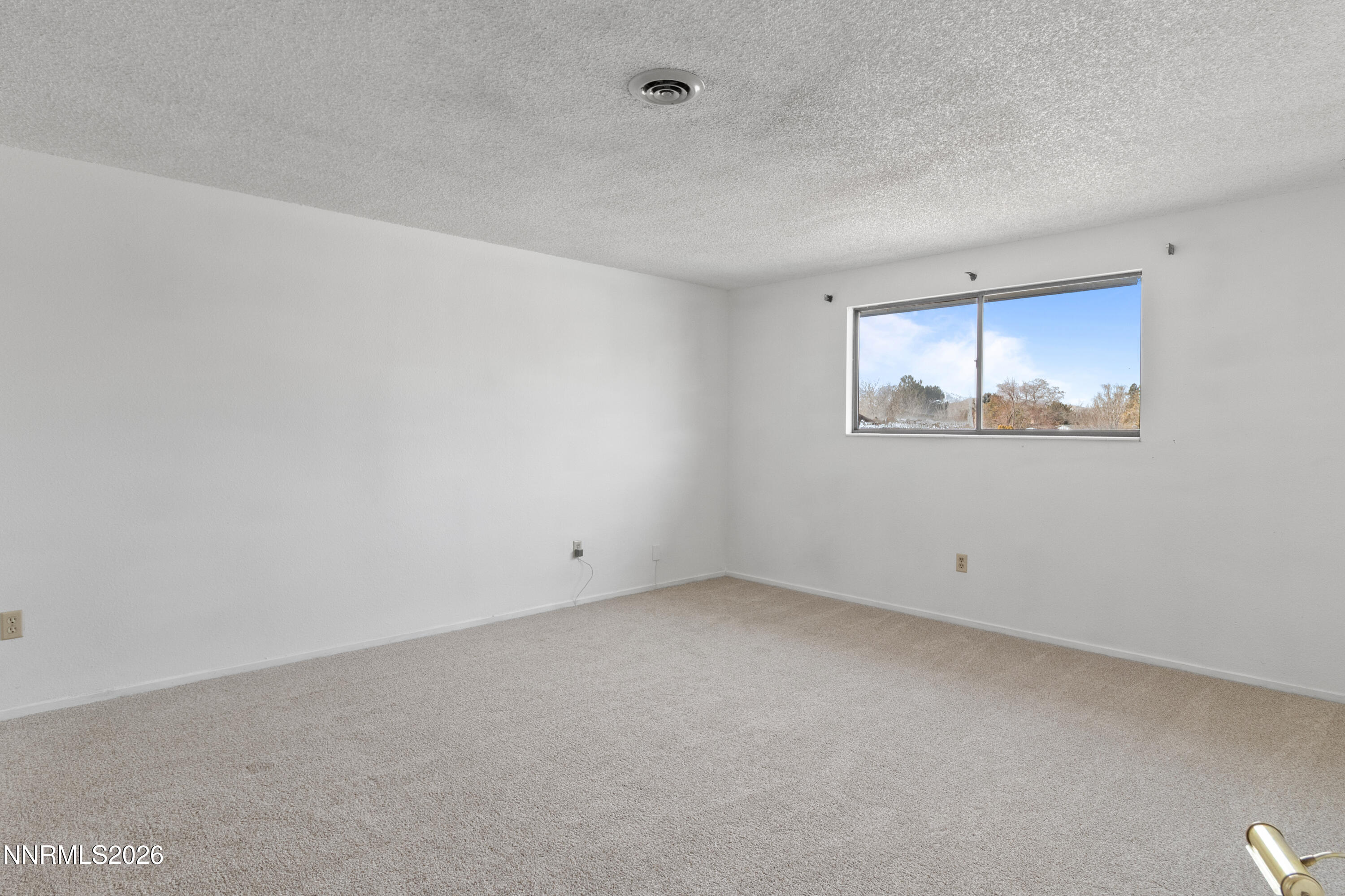 3142 Jarbidge Way Sparks, NV 89434 - Photo 33 of 42 an empty room with a window