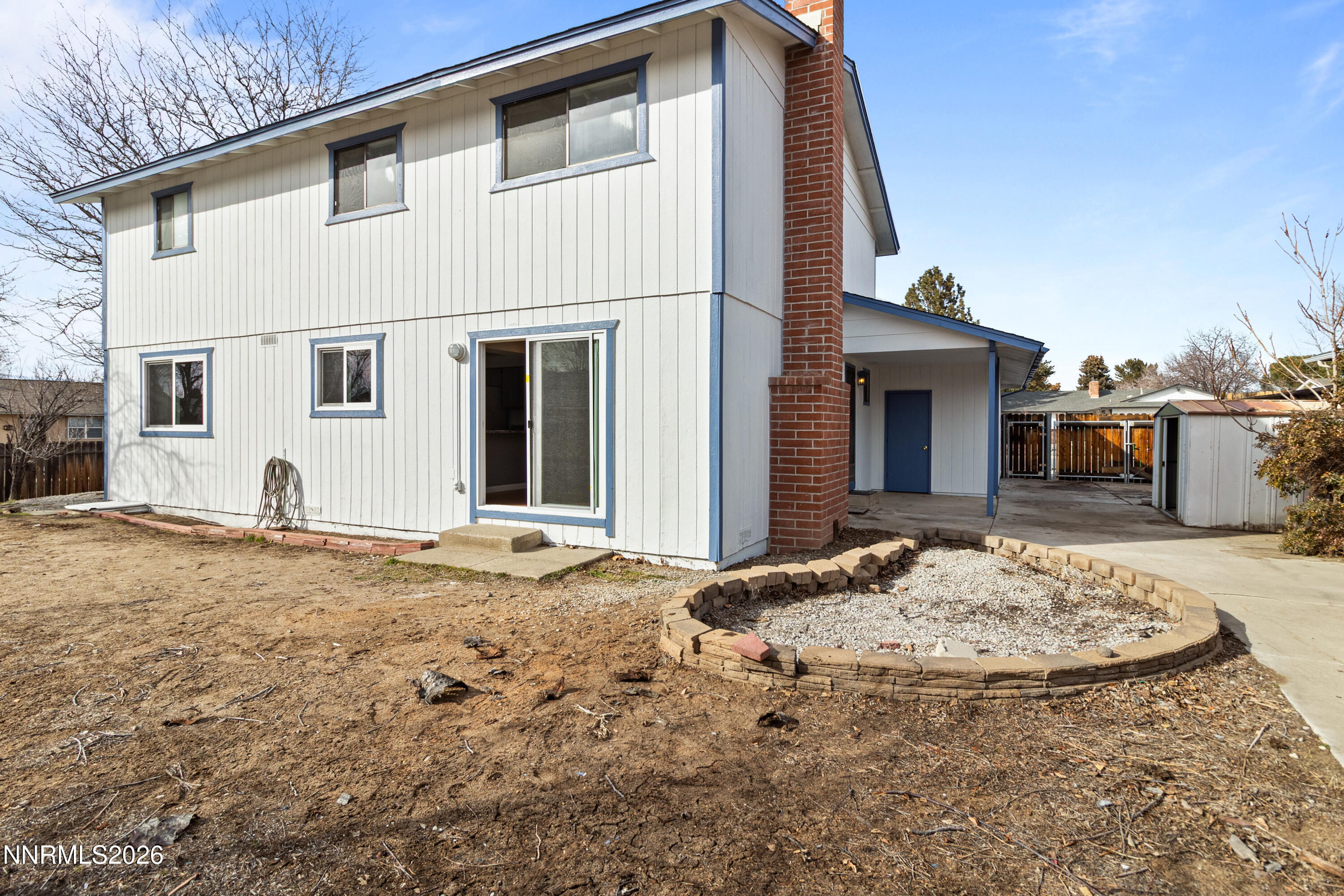 3142 Jarbidge Way Sparks, NV 89434 - Photo 39 of 42 a view of a white house with a yard