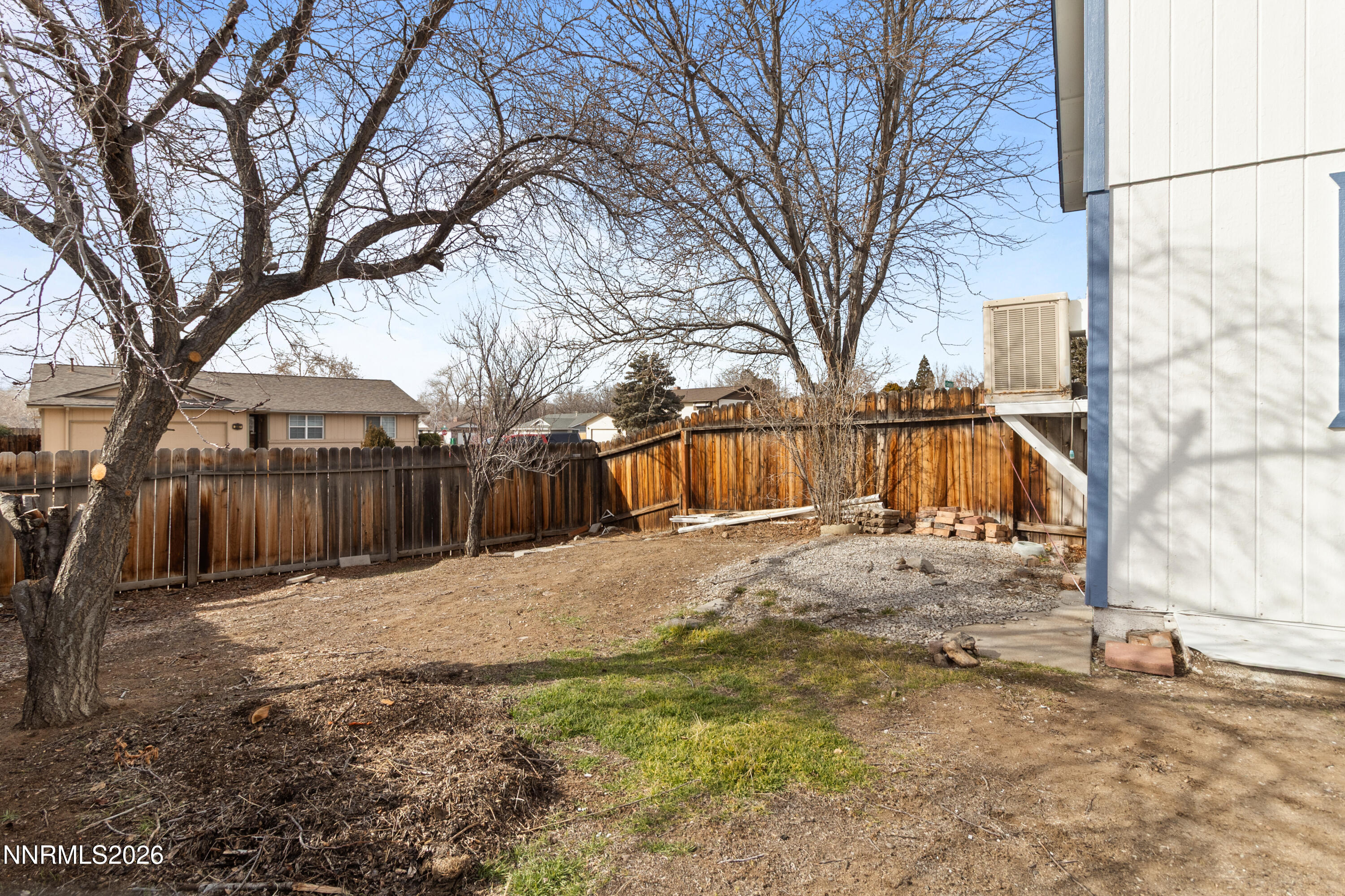 3142 Jarbidge Way Sparks, NV 89434 - Photo 41 of 42 a backyard of a house with large trees