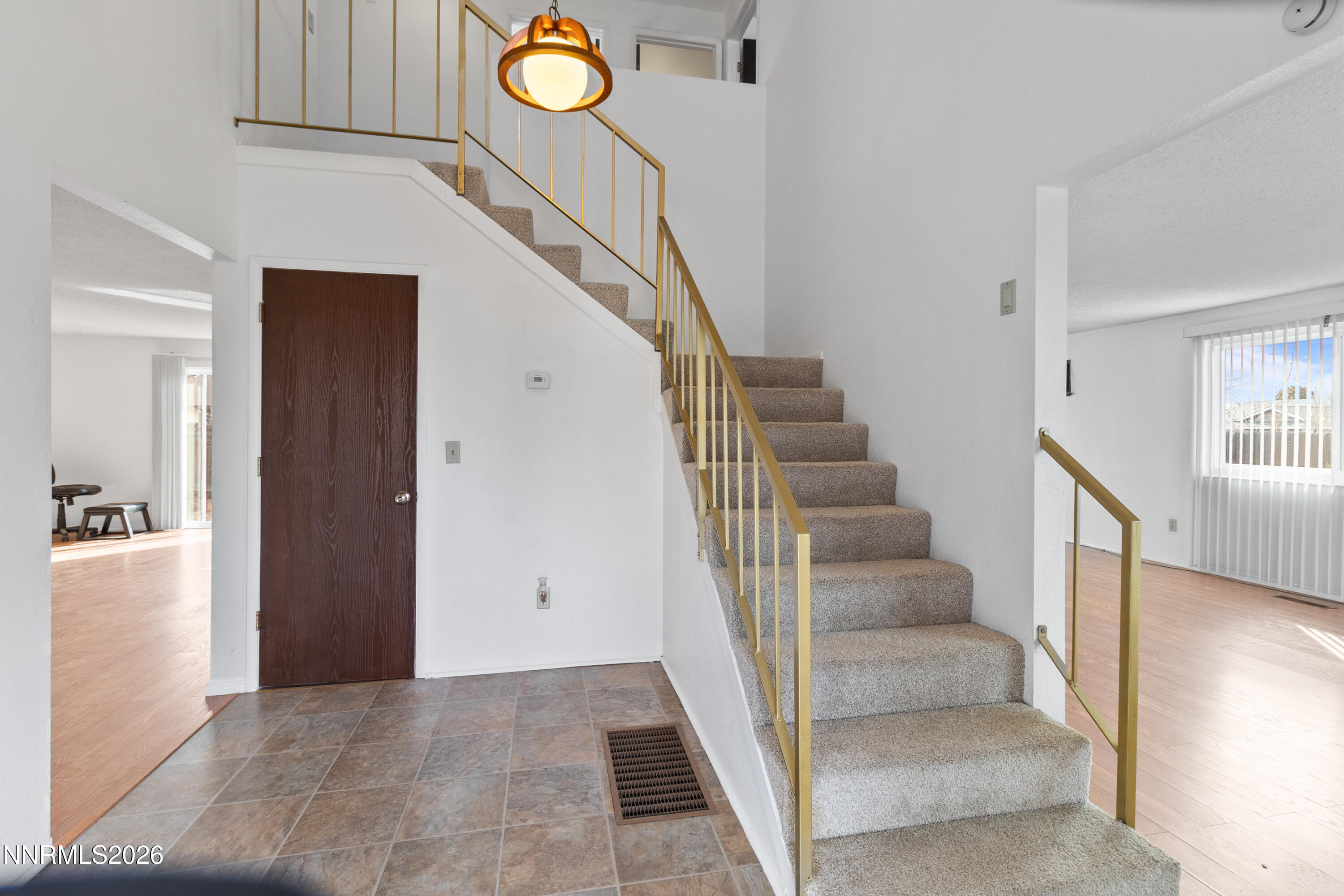 3142 Jarbidge Way Sparks, NV 89434 - Photo 7 of 42 a view of entryway and hall with wooden floor
