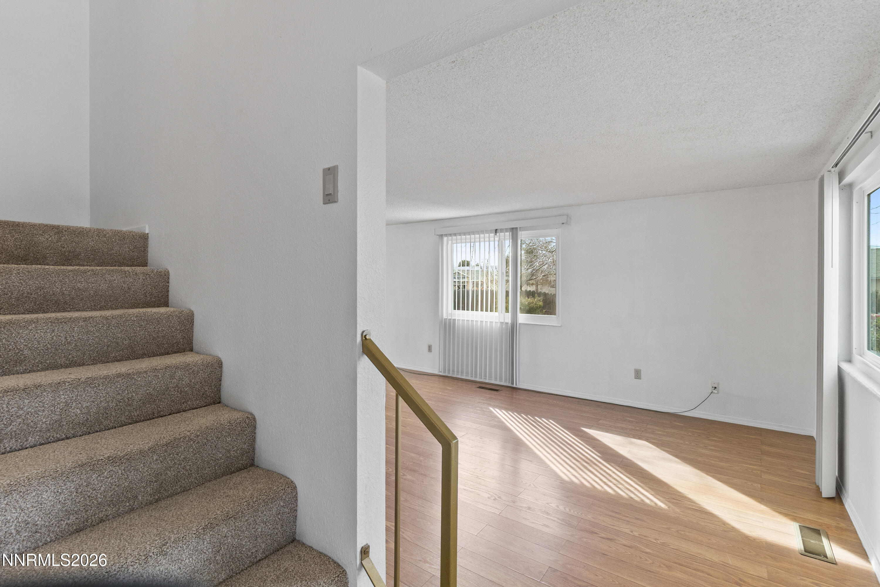 3142 Jarbidge Way Sparks, NV 89434 - Photo 8 of 42 a view of entryway and hall with wooden floor