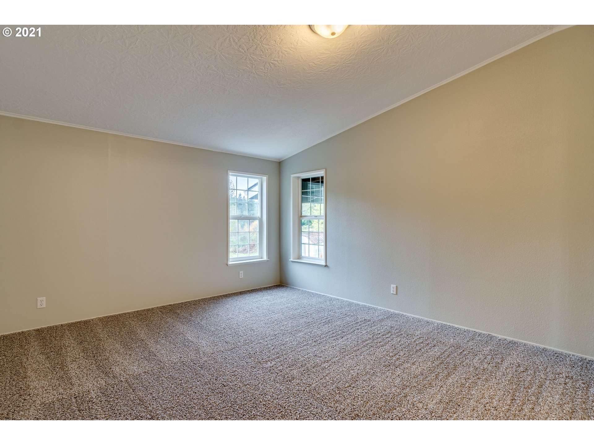 26116 Pellham Hill Road Rainier, OR 97048 - Photo 19 of 32 a view of an empty room with a window