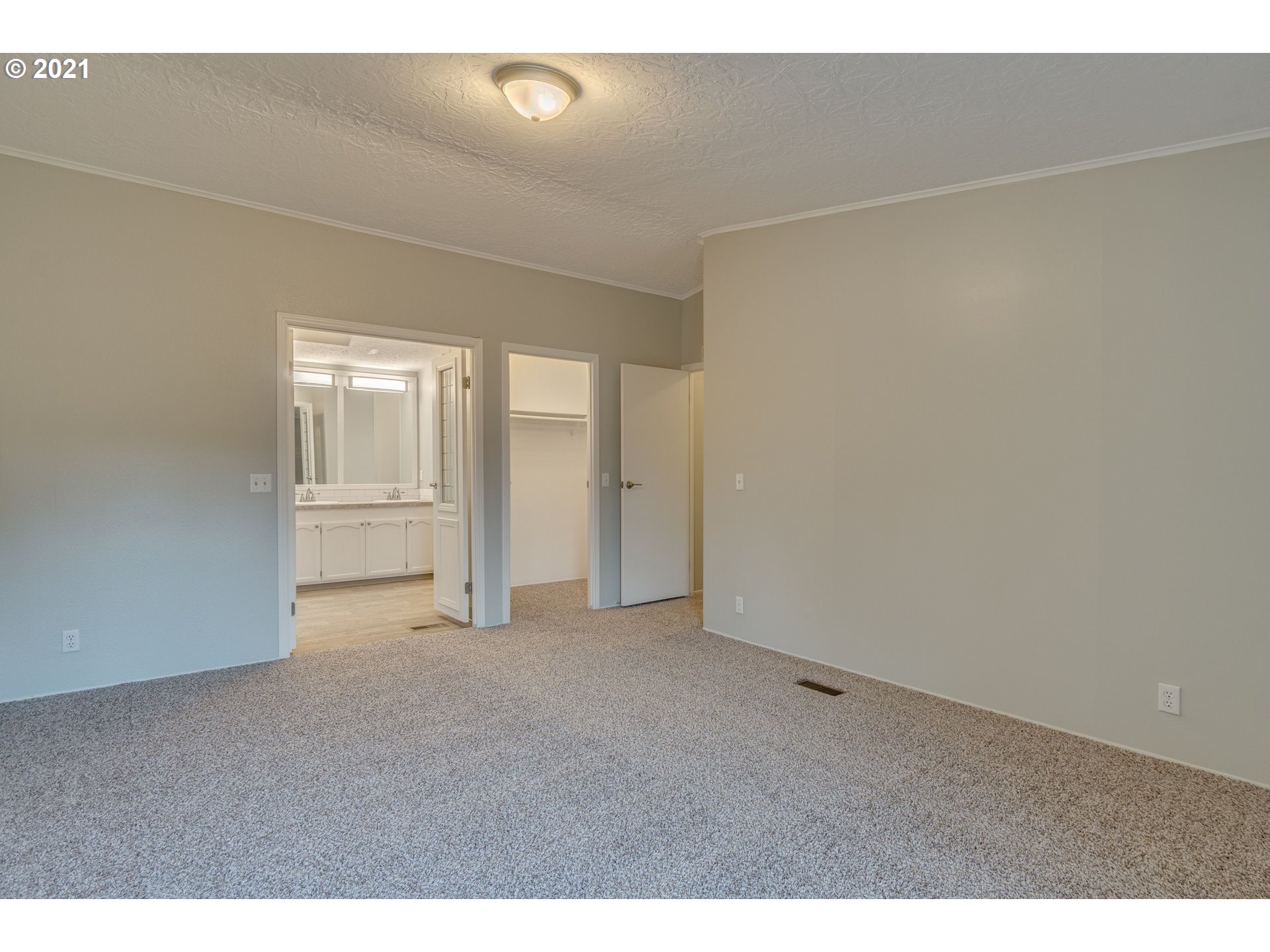 26116 Pellham Hill Road Rainier, OR 97048 - Photo 20 of 32 a view of an empty room with chandelier