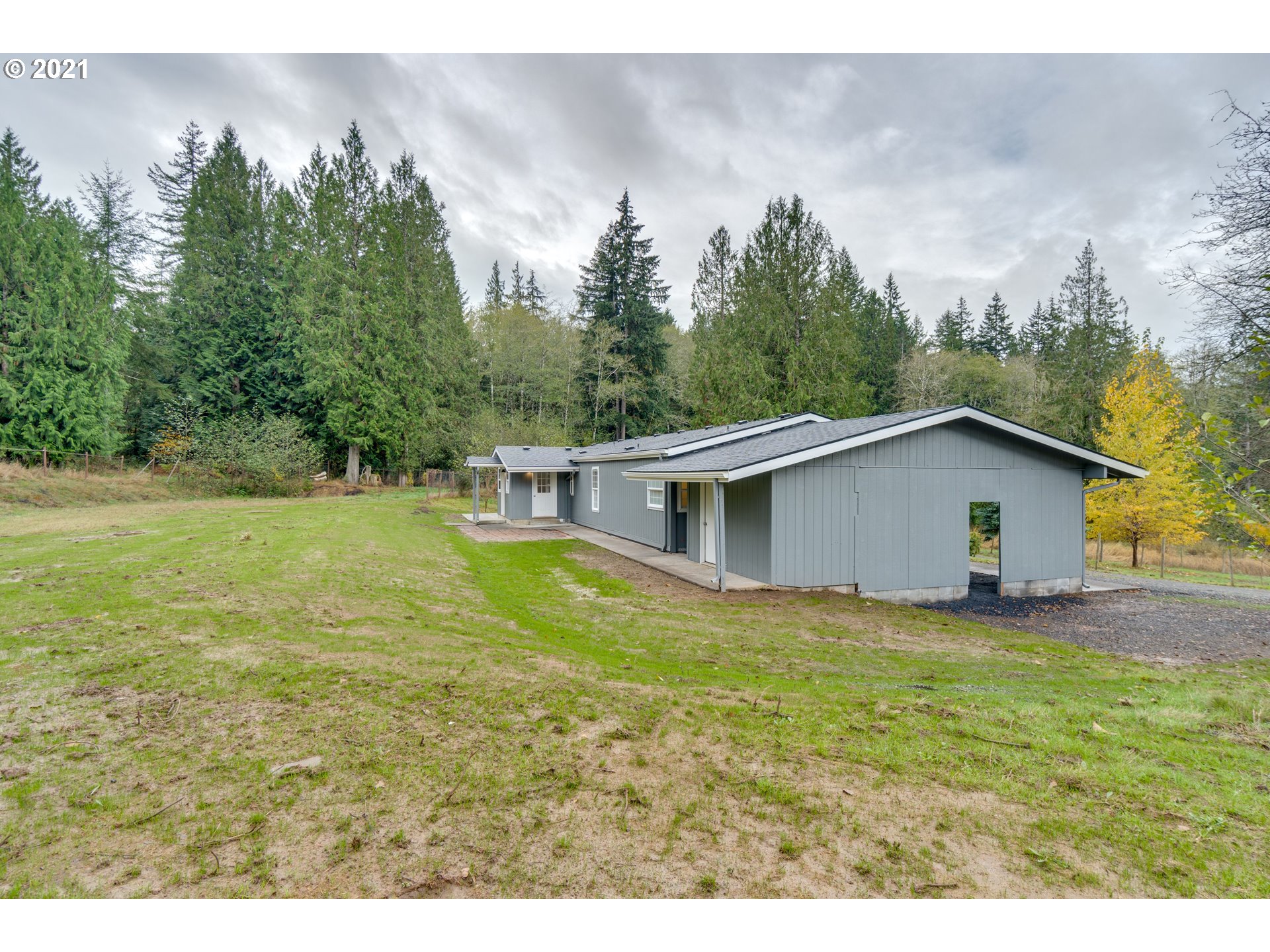 26116 Pellham Hill Road Rainier, OR 97048 - Photo 24 of 32 a view of a house with a yard
