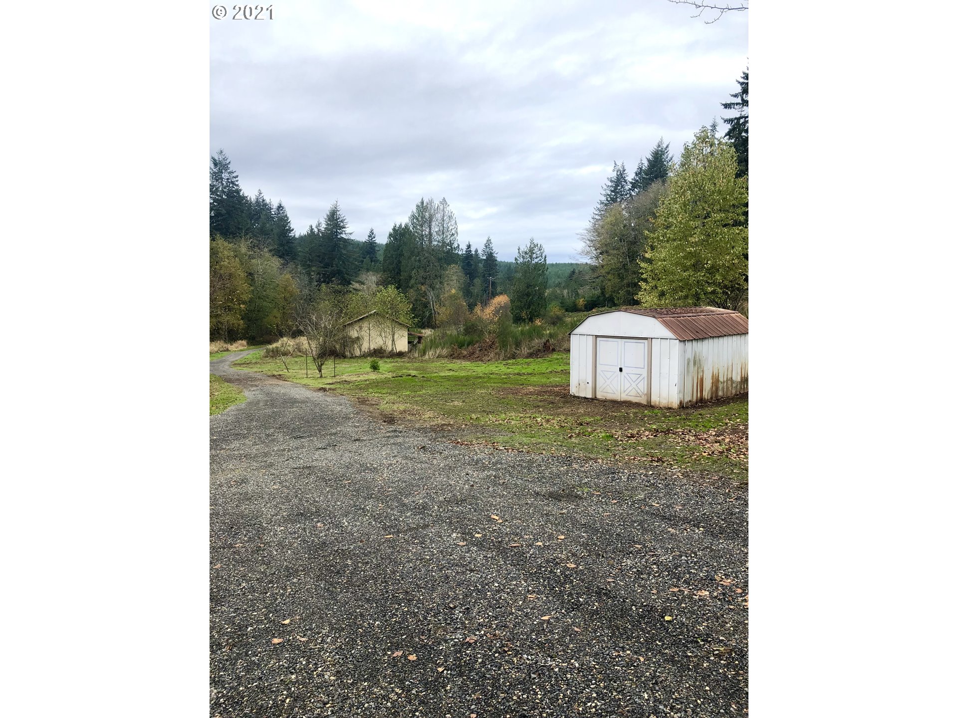 26116 Pellham Hill Road Rainier, OR 97048 - Photo 28 of 32 a view of a dry yard with wooden fence