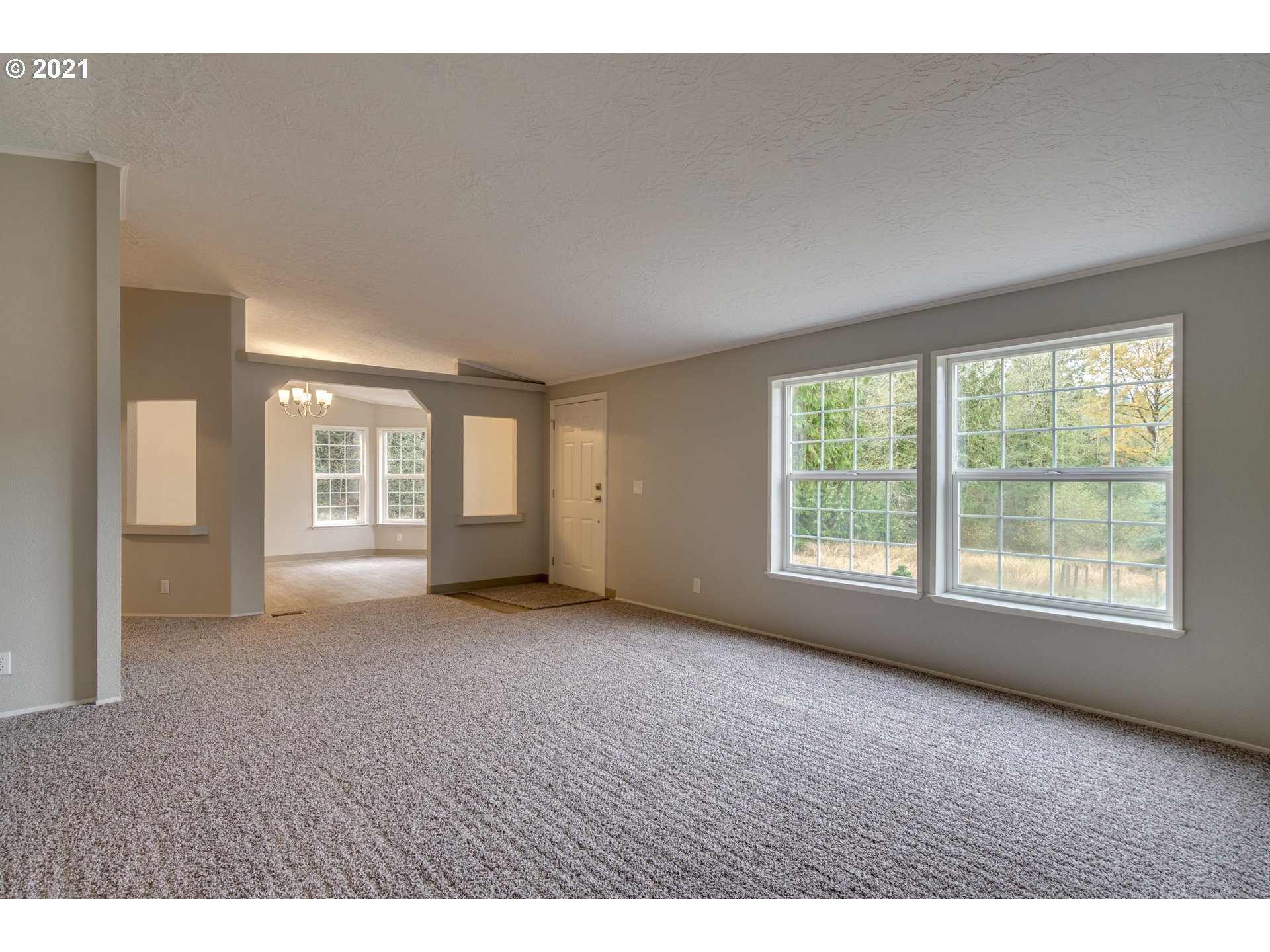 26116 Pellham Hill Road Rainier, OR 97048 - Photo 3 of 32 a view of an empty room with a window