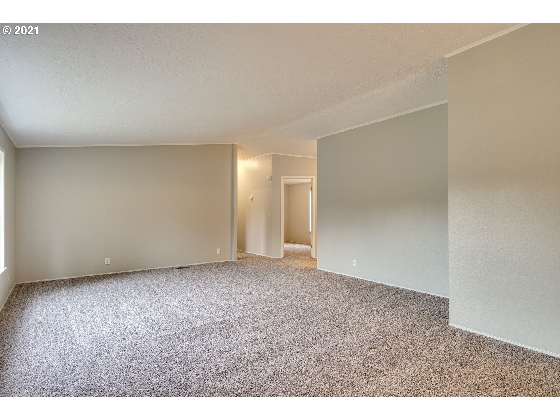 26116 Pellham Hill Road Rainier, OR 97048 - Photo 4 of 32 a view of an empty room and wooden floor