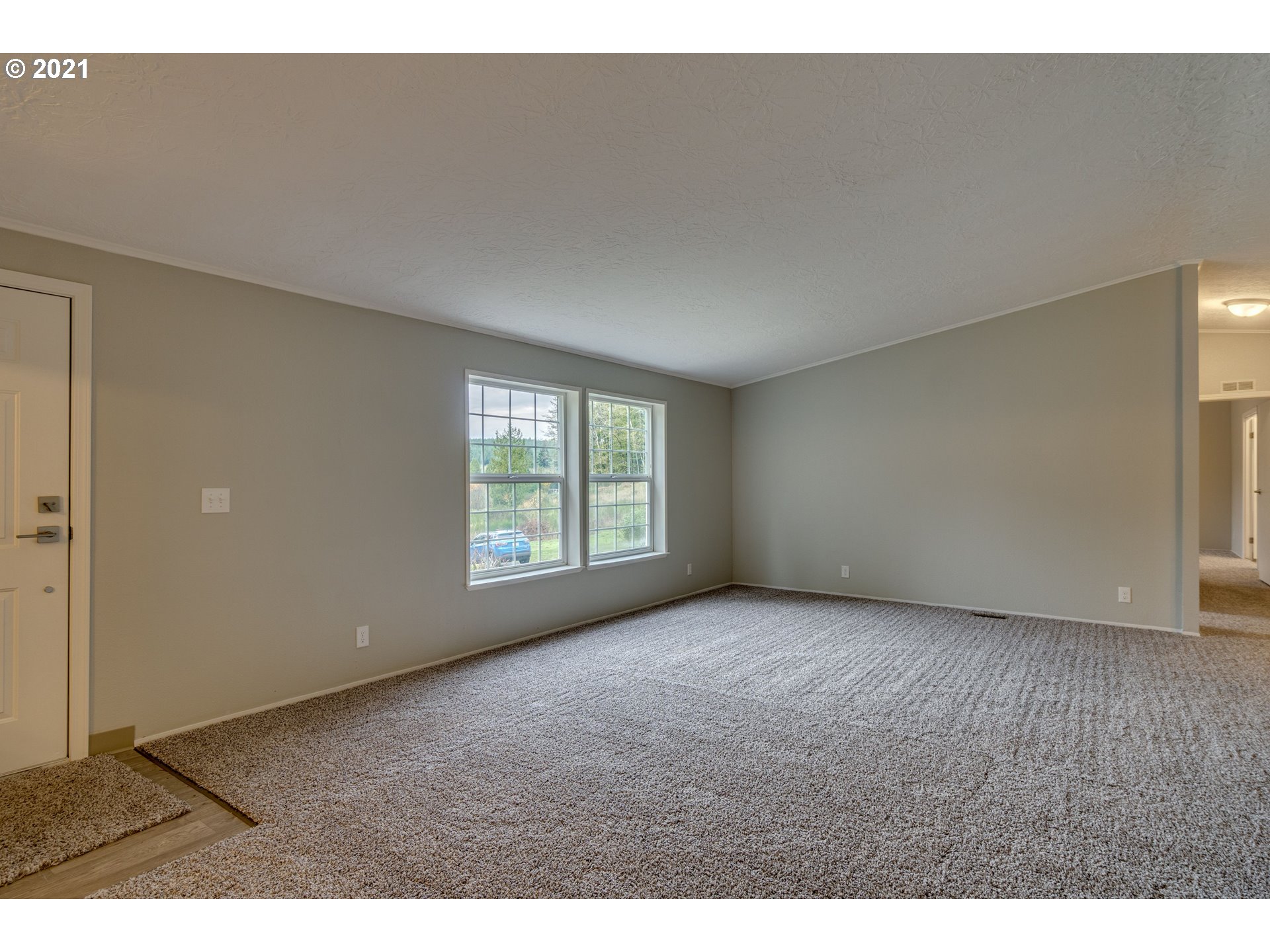 26116 Pellham Hill Road Rainier, OR 97048 - Photo 5 of 32 a view of an empty room with a window