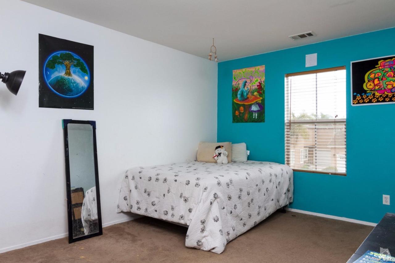 1731 Sonata Drive Oxnard, CA 93030 - Photo 11 of 15 a bedroom with a bed and a window