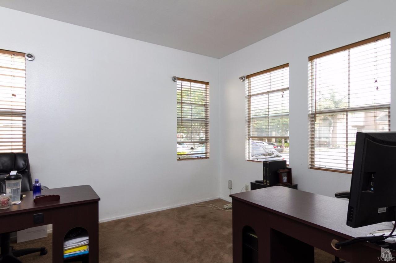 1731 Sonata Drive Oxnard, CA 93030 - Photo 8 of 15 a view of a workspace with furniture and a window