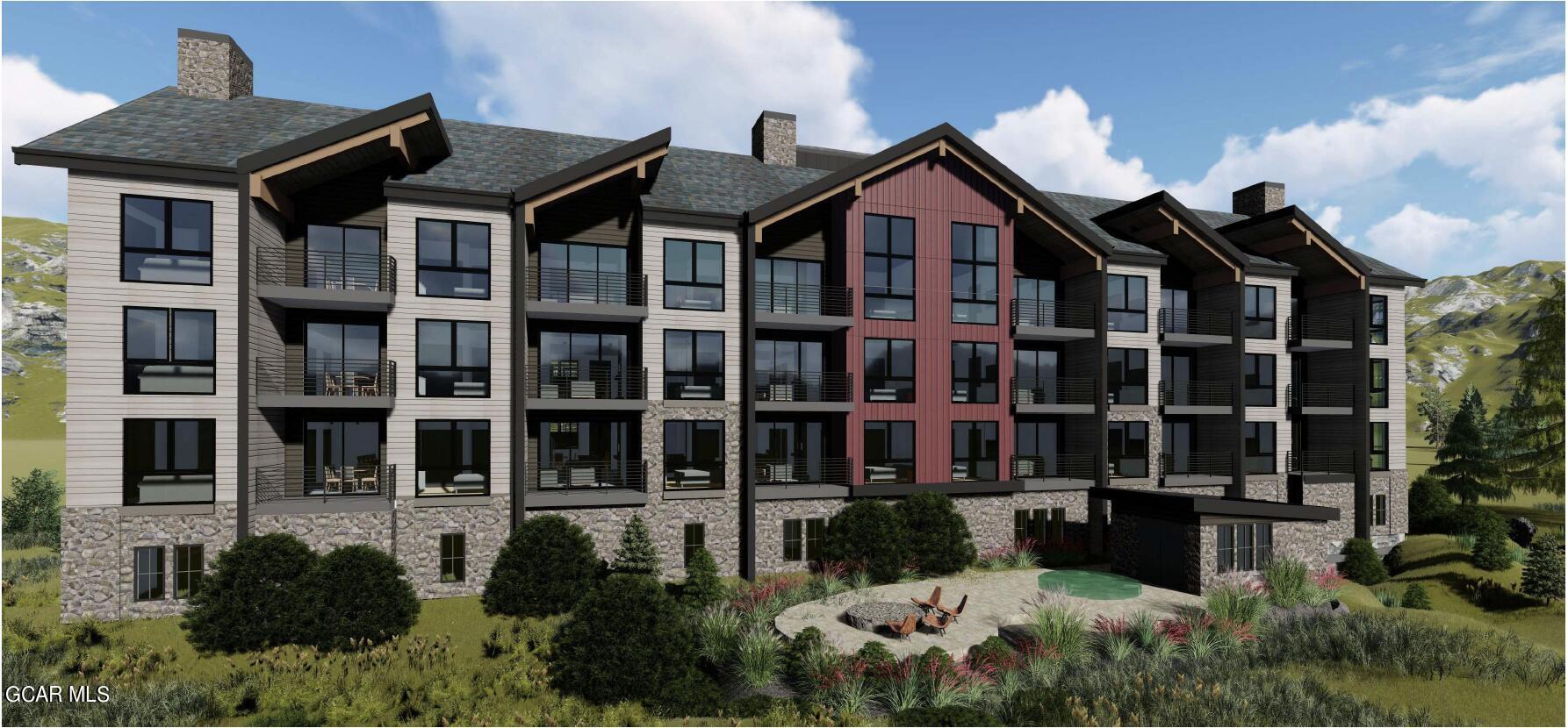 720 Baker Drive, Unit 204 Winter Park, CO 80482 - Photo 2 of 3 a front view of a house with a garden