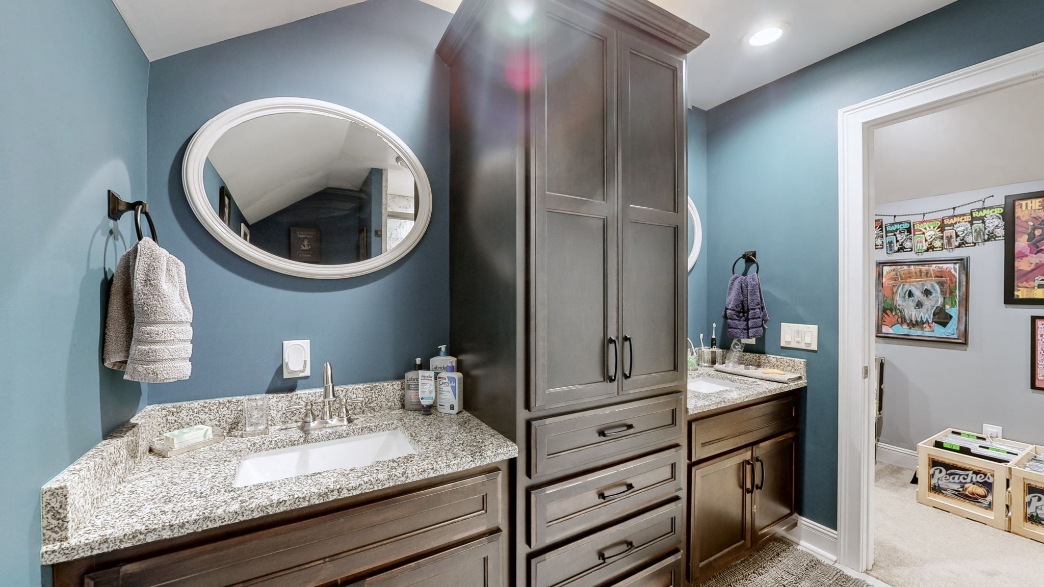 1019 Parker Road Kingston Springs, TN 37082 - Photo 31 of 39 a bathroom with a granite countertop sink and a mirror