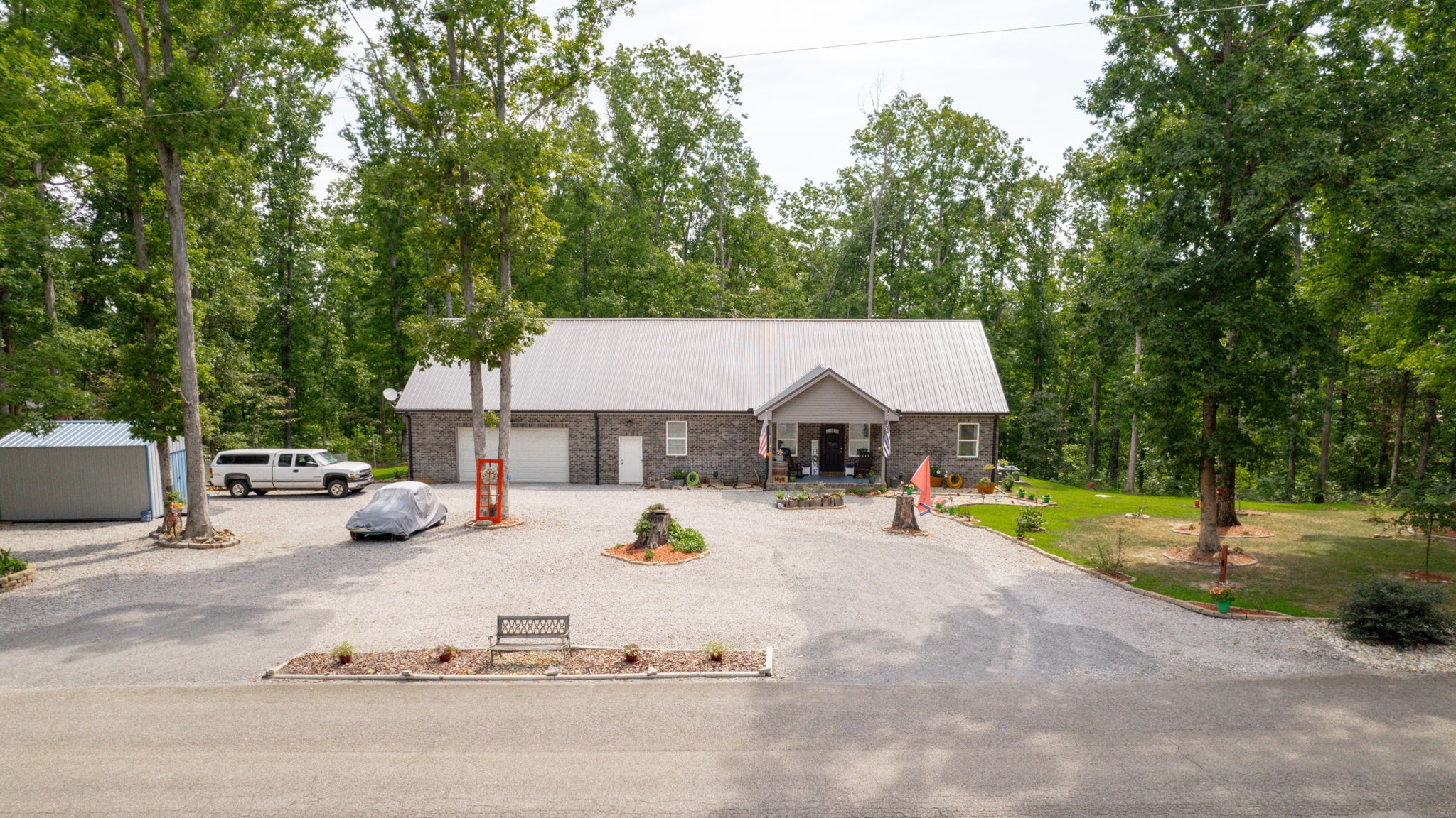 1019 Parker Road Kingston Springs, TN 37082 - Photo 38 of 39 a view of a house with swimming pool and sitting area