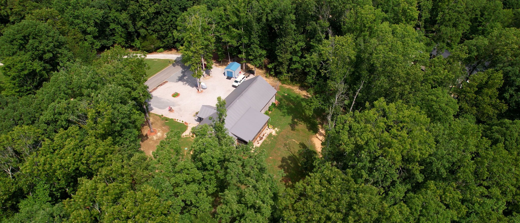 1019 Parker Road Kingston Springs, TN 37082 - Photo 39 of 39 an aerial view of residential house with outdoor space and trees all around