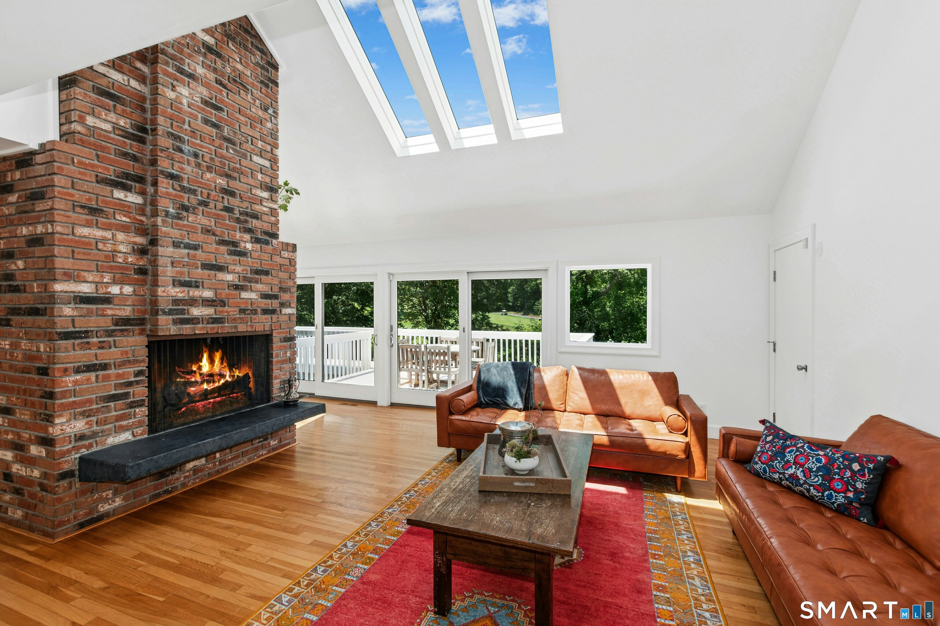 38 Old Redding Road Weston, CT 06883 - Photo 6 of 40 Note the sliders in this Living Room that provide access to...