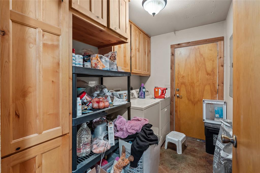 262 North Cheyenne Springtown, TX 76082 - Photo 13 of 35 Laundry area with cabinet space and separate washer and dryer