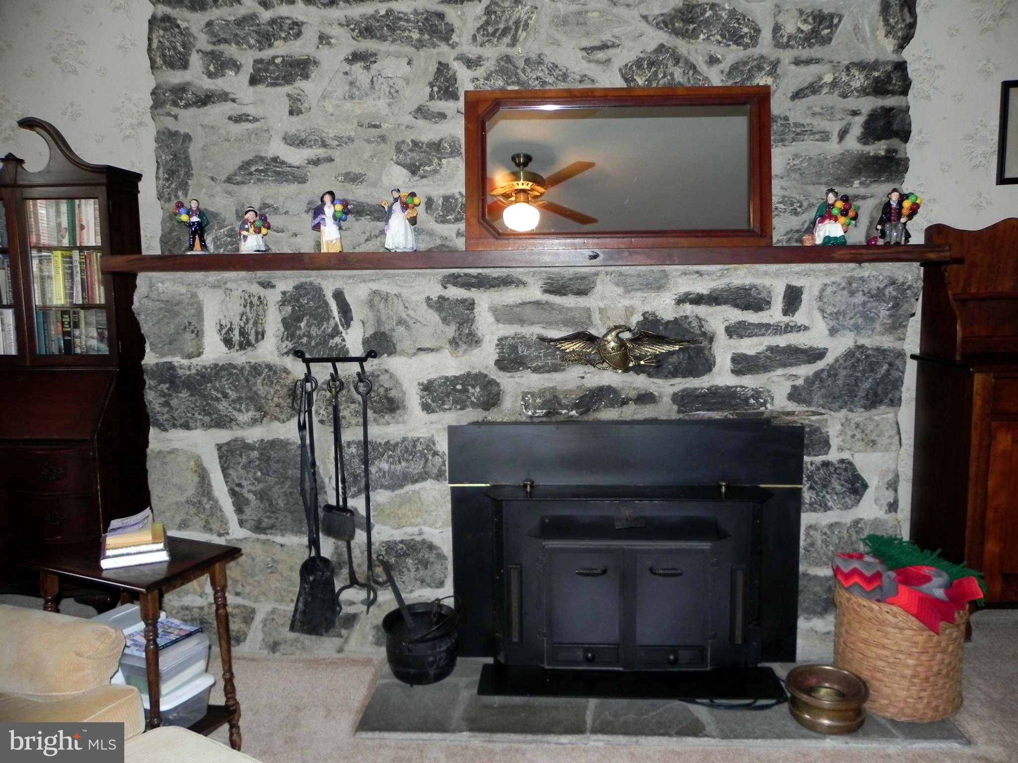 2909 Old Leetown Pike Ranson, WV 25438 - Photo 13 of 28 Wood Stove in Family Room