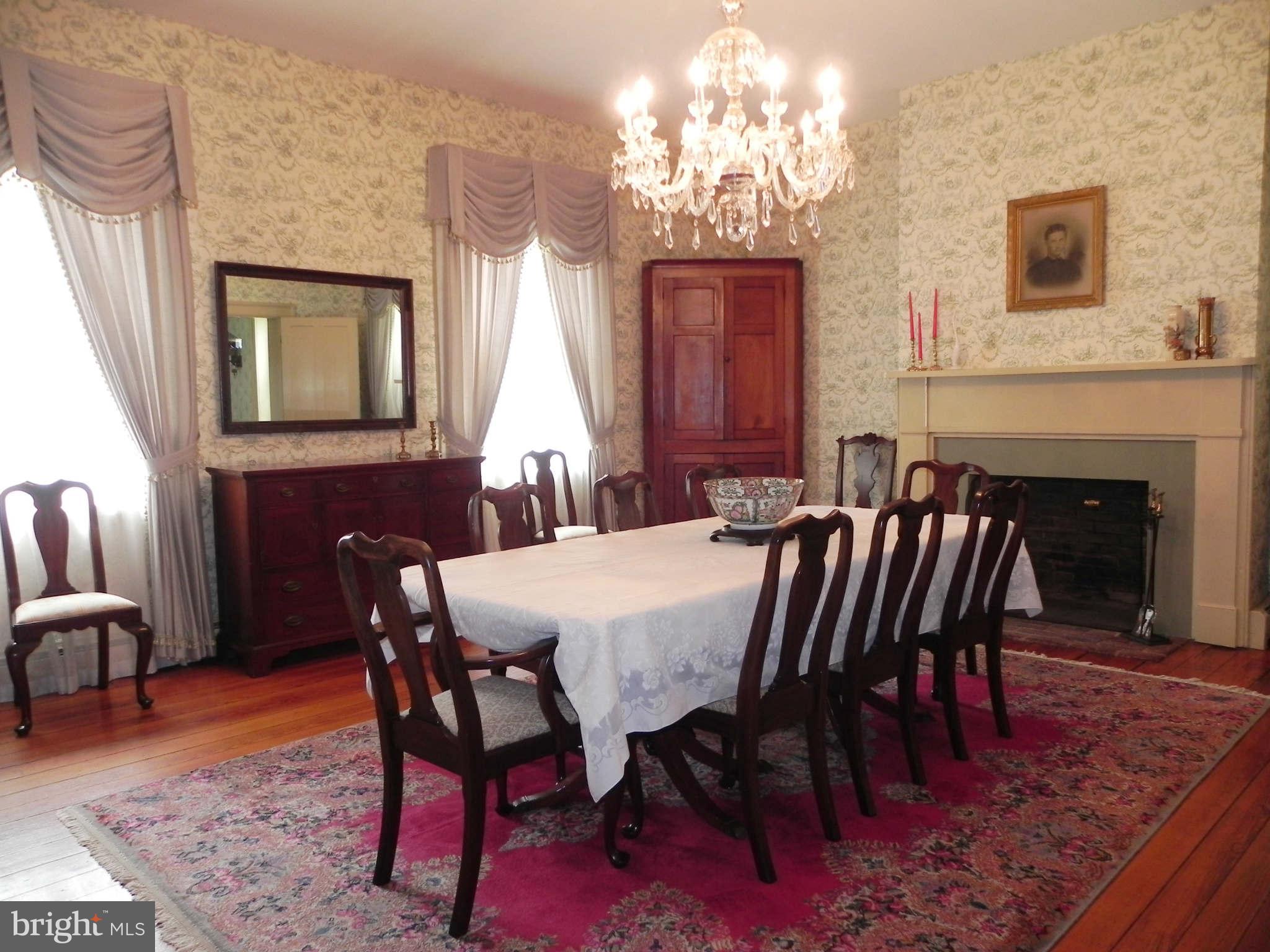 2909 Old Leetown Pike Ranson, WV 25438 - Photo 7 of 28 Formal Dining Room w/ Fireplace