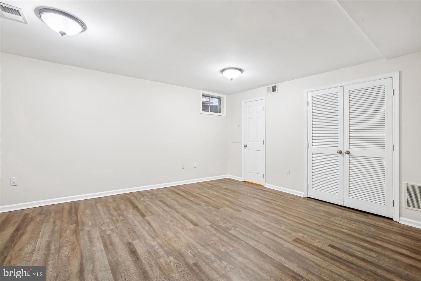 7728 Hickory Glen Way Springfield, VA 22153 - Photo 29 of 35 wooden floor in an empty room